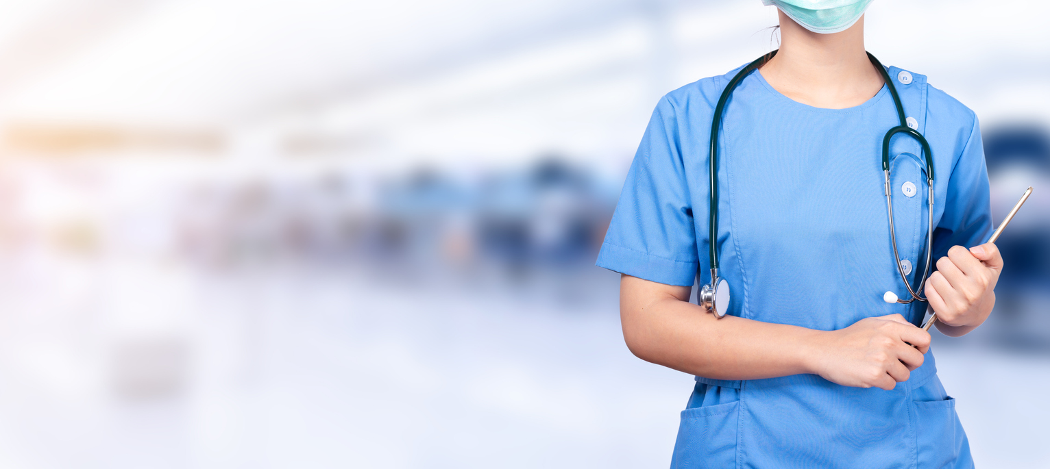 Nurse holding digital tablet in hospital