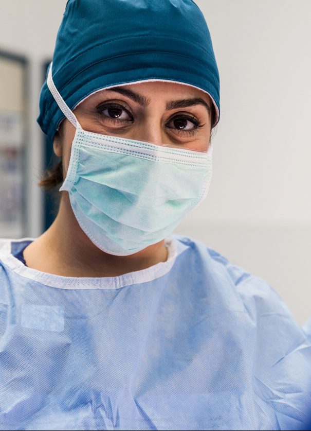 Confident focused female surgeon
